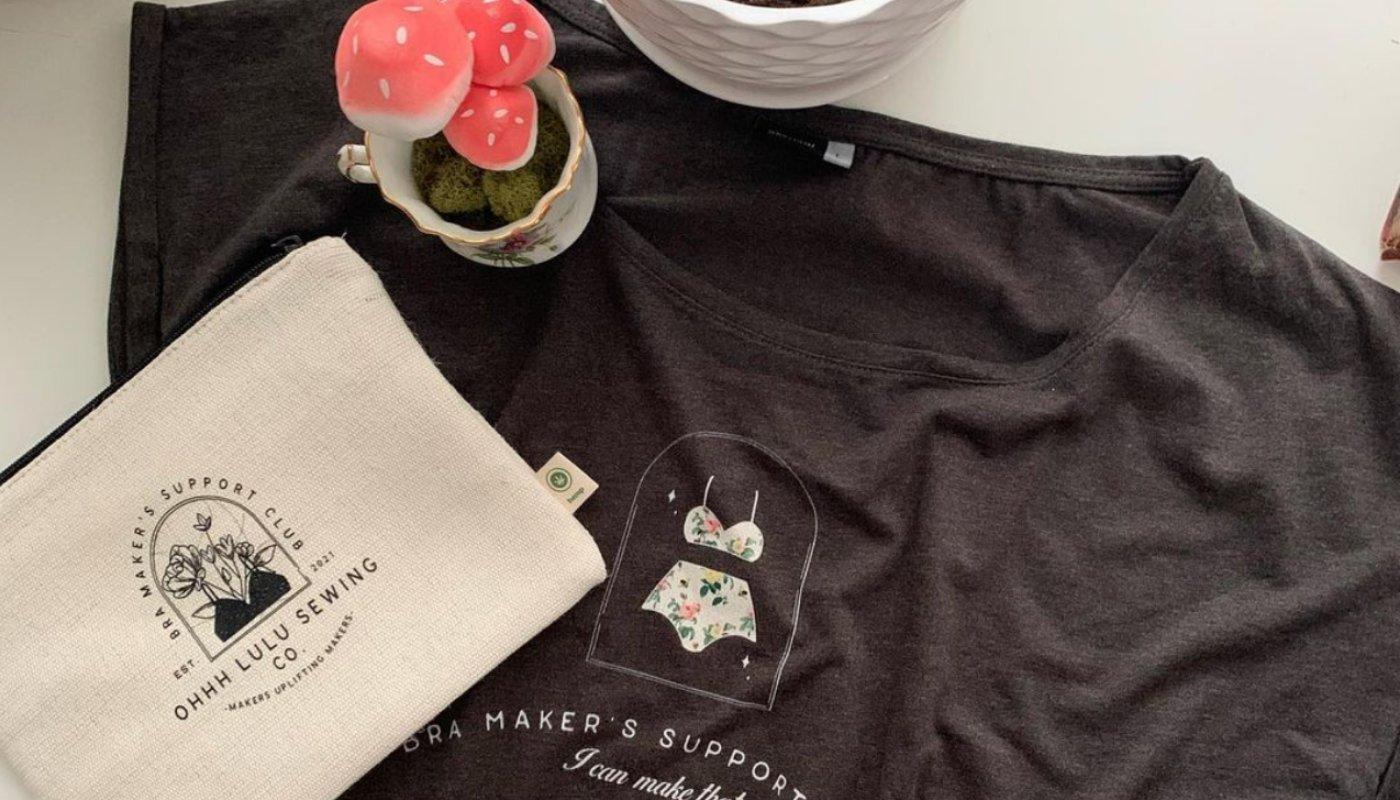 flatlay of promotional merch examples like a t-shirt or pouch to use in fundraising efforts